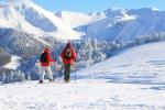 Sneeuwschoenwandeling met uitzicht op de skiliften van Les Chomets