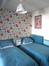 La chambre de l'appartement Puy de Dôme